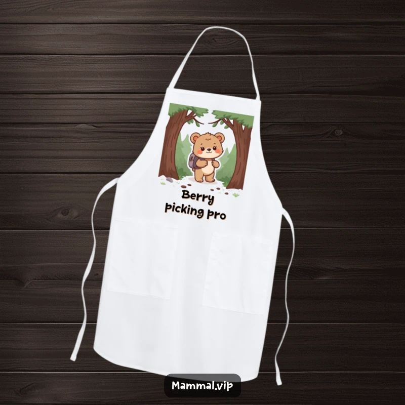 Funny bear cub with a backpack, ready for kitchen adventures, on a chef's apron. A practical and funny gift.