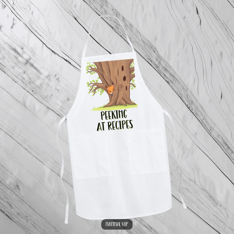 Funny apron showcasing a curious fox kit peeking from behind a large oak tree, adding whimsical protection to kitchen wear.