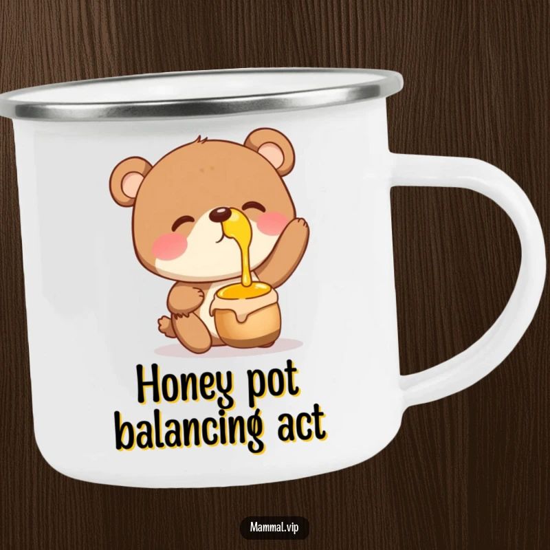 Funny Camping Mug showing a giggling bear character balancing a honey pot on its nose, perfect for campfires and sweet treats.