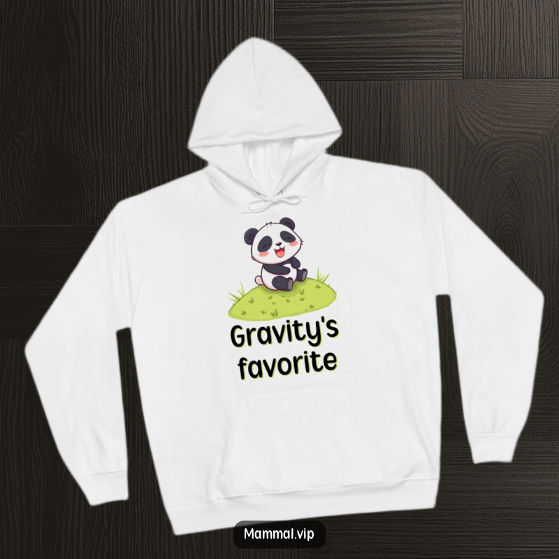 Funny hoodie showing a joyful panda character mid-roll down a vibrant green grassy hill, radiating happiness and lightheartedness.