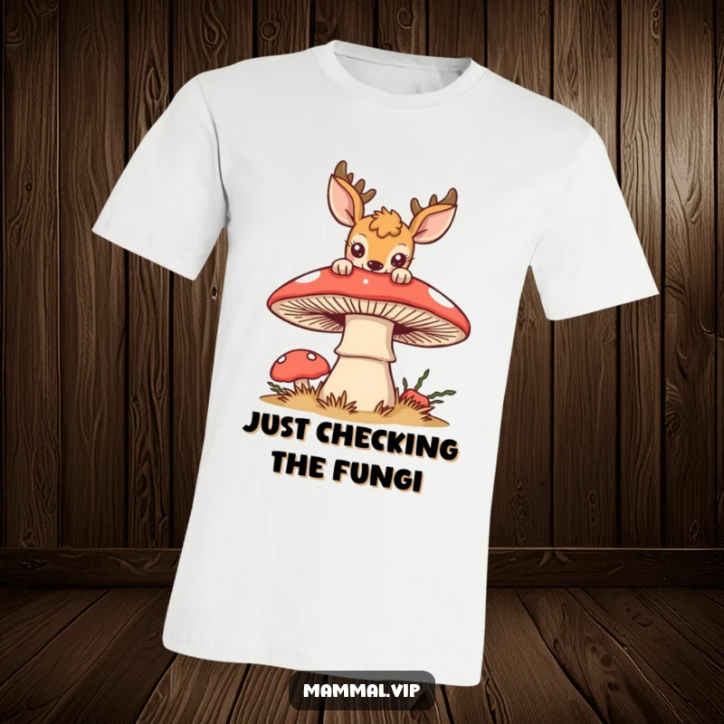 Funny deer t-shirt with a curious deer looking over a large, stylized mushroom, capturing a moment of forest wonder.